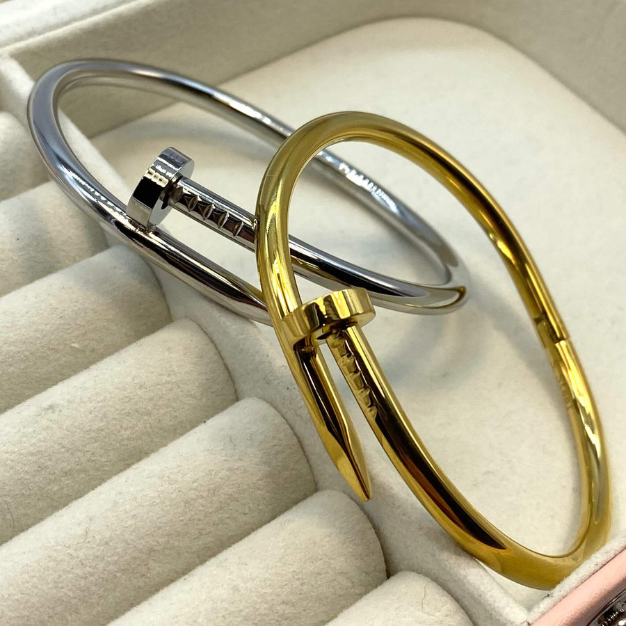 Bracciale chiodo rigido in acciaio inossidabile, con una chiusura a scatto, nei colori oro e argento - Iride Shop Bijoux e Accessori